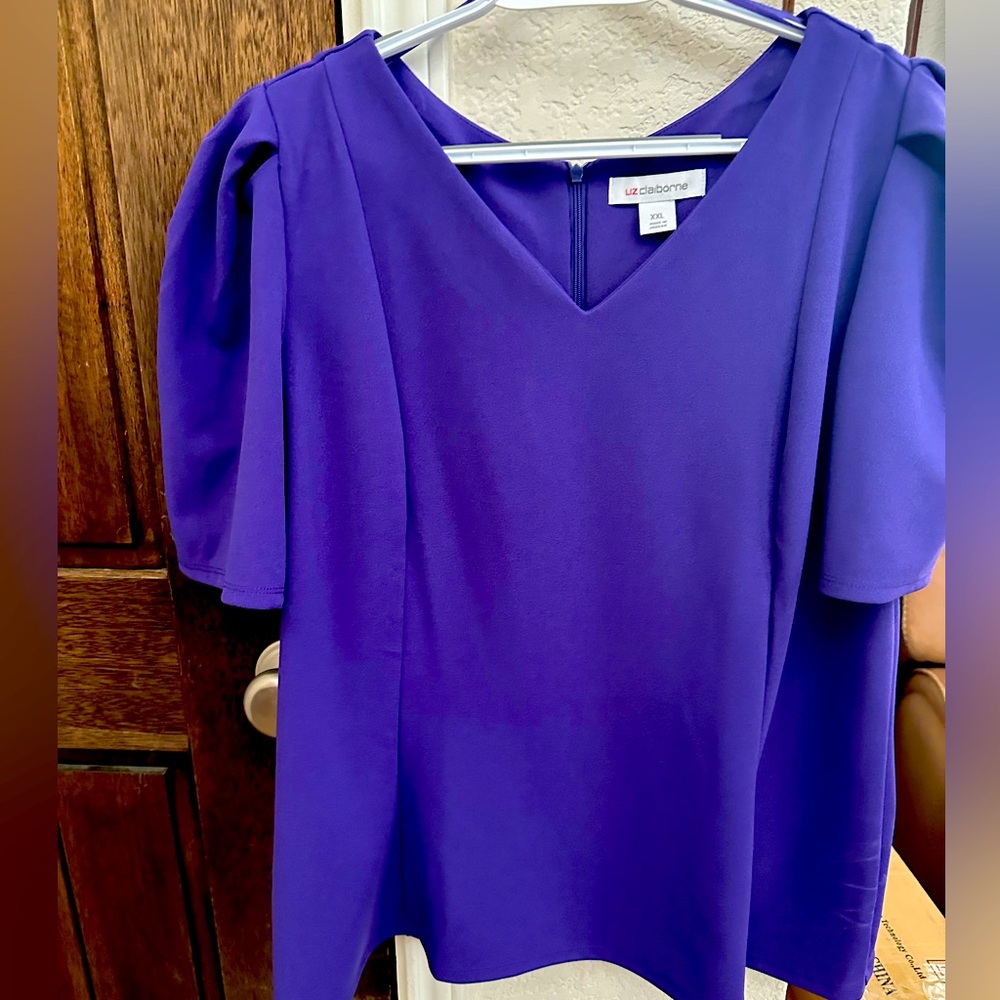 Tore tags off but never worn. Liz Claiborne peplum top